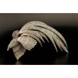 Sterling silver bird of paradise brooch set with marcasite and a garnet eye, hallmarked Birmingham