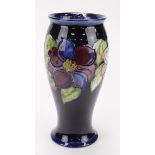 Moorcroft. Good quality 1950's 'Clematis' vase. Signed W Moorcroft. Height 25cm