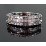 18ct white gold three row diamond ring consisting of central channel set recessed row of baguette