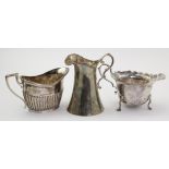 Three Edward VII silver milk jugs, hallmarked London 1903, 1904 & 1908, tallest 9cm approx.,