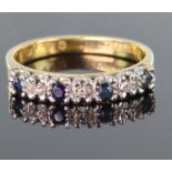 18ct yellow gold half eternity ring set with alternating round sapphires and diamonds in claw