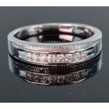 9ct white gold half eternity ring set with eight round brilliant cut diamonds totalling 0.24ct in