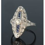 Platinum diamond and sapphire Art Deco style marquise shaped ring set with three round brilliant cut