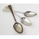 Three George III silver old English pattern table spoons, each with monogram to handle, hallmarked