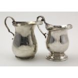 Two silver milk jugs, hallmarked Sheffield 1934 & 1970, tallest 9.5cm approx., weight 7.5 oz.