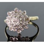 9ct four tiered dress ring set with twenty five round diamonds totalling approx. 0.25ct, finger size