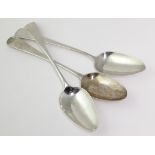 Three George III silver old English pattern table spoons, hallmarked London 1798, 1802 & 1804,