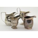 Four Chester hallmarked silver milk jugs, hallmarked Chester 1898, 1904 & 1908 ( x 2), tallest