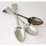 Three William IV silver fiddle pattern table spoons, two with monograms to handles, two with