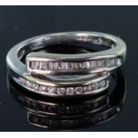 18ct white gold double channel set ring set with round and baguette cut diamonds with a total