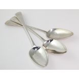 Three George III silver old English pattern table spoons, each with monogram / initials to handle,