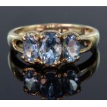 9ct yellow gold ring set with three graduated Santa Maria aquamarine stones, totalling 1.259ct,