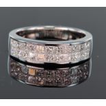 18ct white gold half eternity ring set with two rows of princess cut diamonds totalling 1.2ct