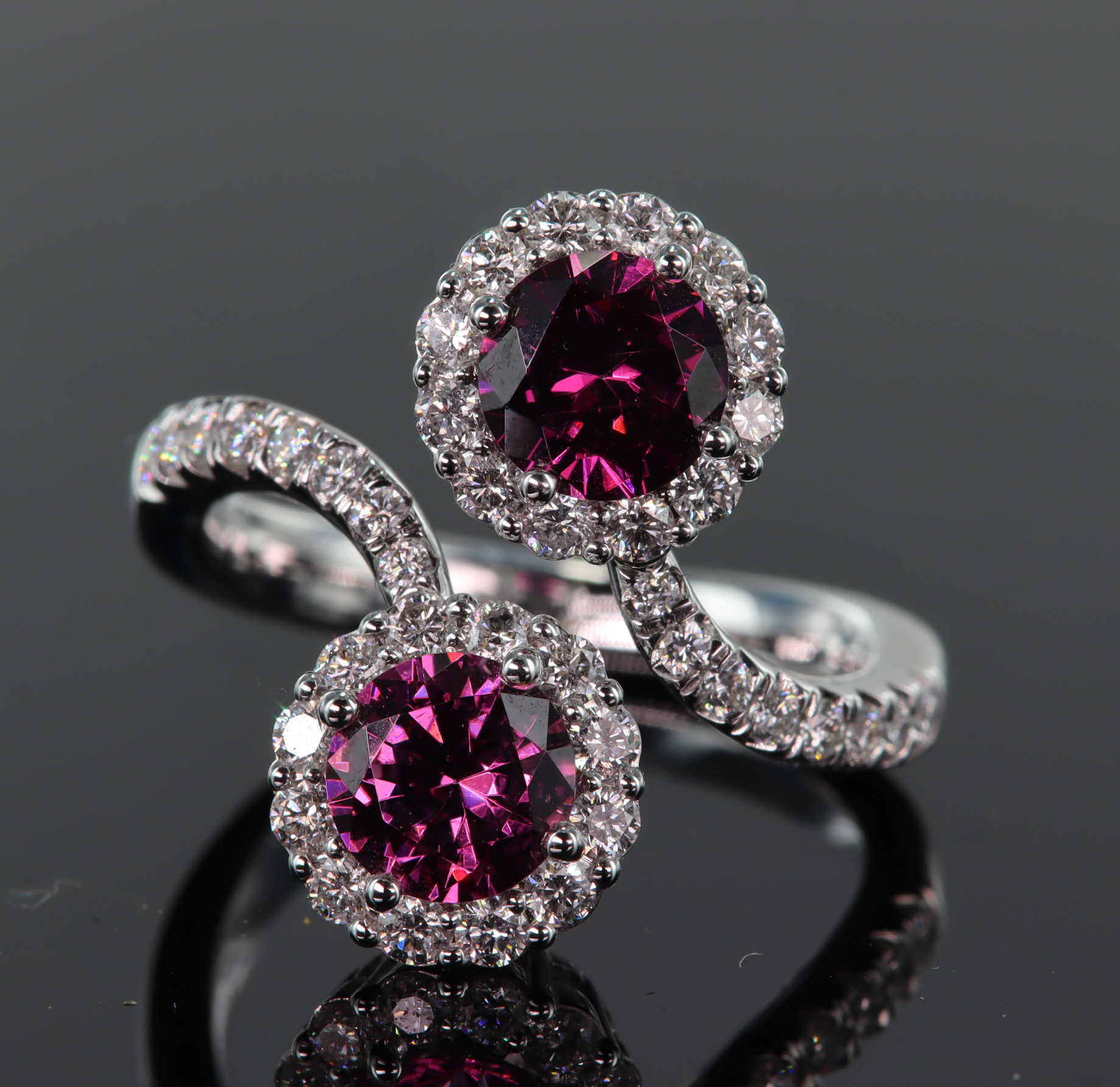 18ct white gold double cluster crossover design ring set with two round pink tourmaline measuring