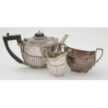 Silver matching teapot, sugar bowl & milk jug, each with monogram to side, hallmarked 'JDWD,