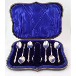 Boxed set of six silver Apostle coffee spoons, plus a pair of silver Apostle Sugar Tongs, hallmarked