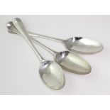 Three George III silver Hanoverian pattern table spoons, two with initials to handles, hallmarks