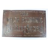 Welsh Economic Building Society wall sign/plaque, heavy metal sign probably brass with lettering and