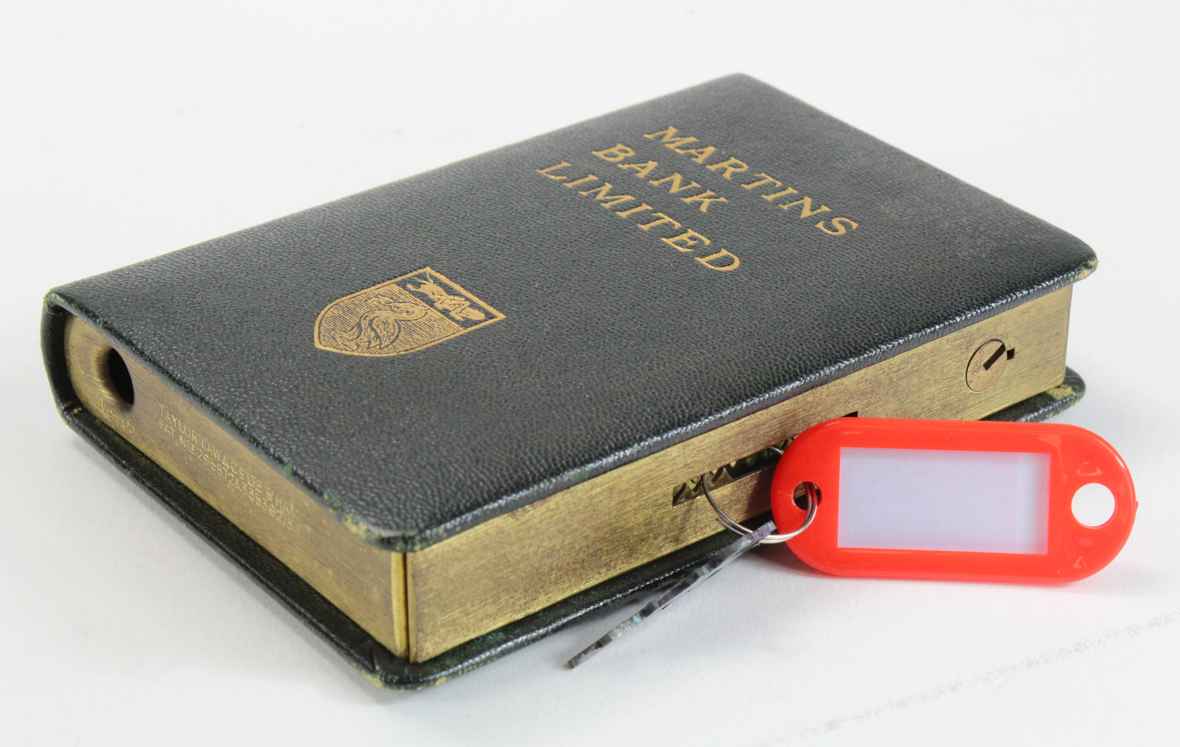 Money box, Martins Bank Limited, book design, number 10934, complete with key, very good condition