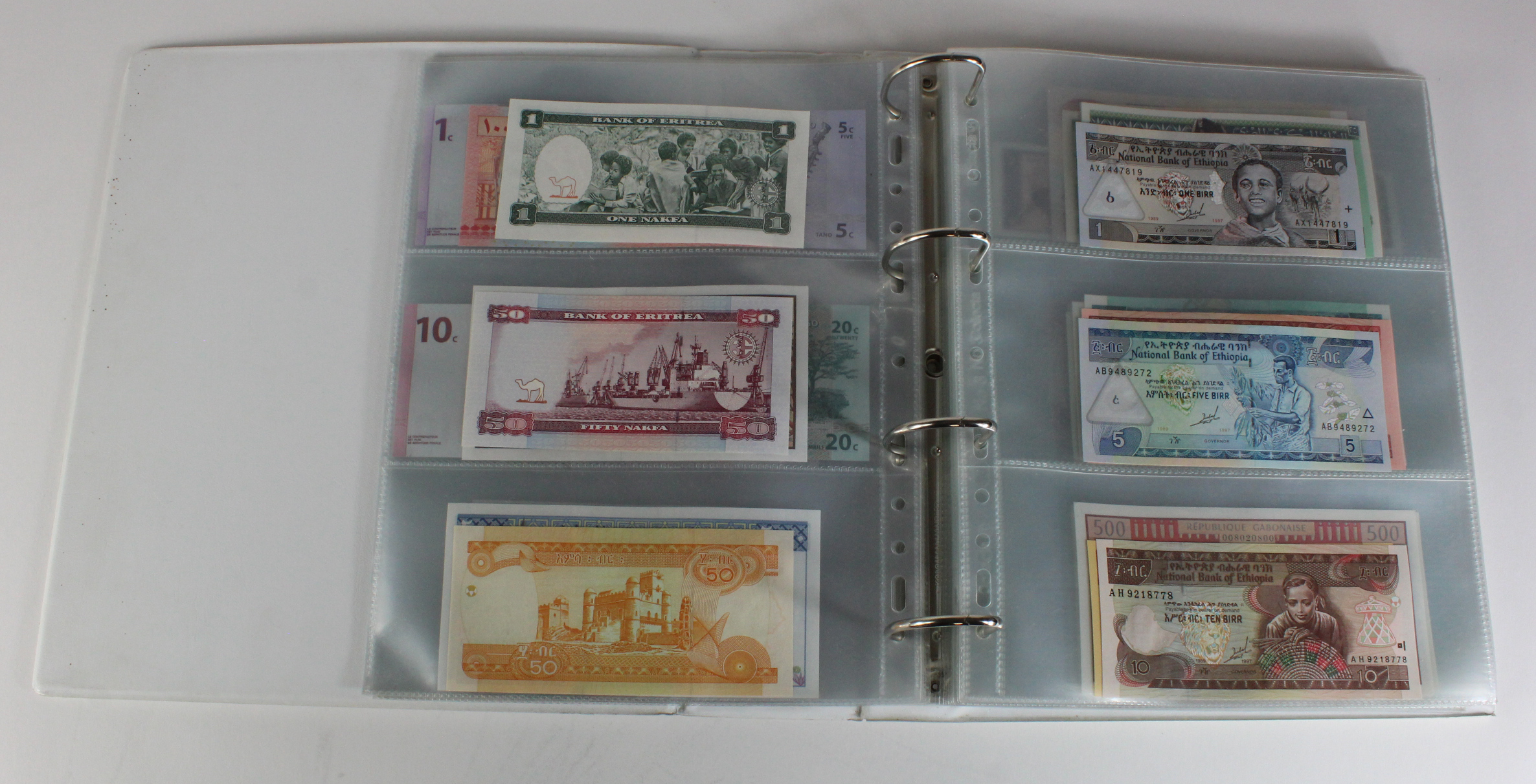 World, Africa (151) a superb collection of Uncirculated notes in an album, Algeria, Angola, - Image 10 of 44