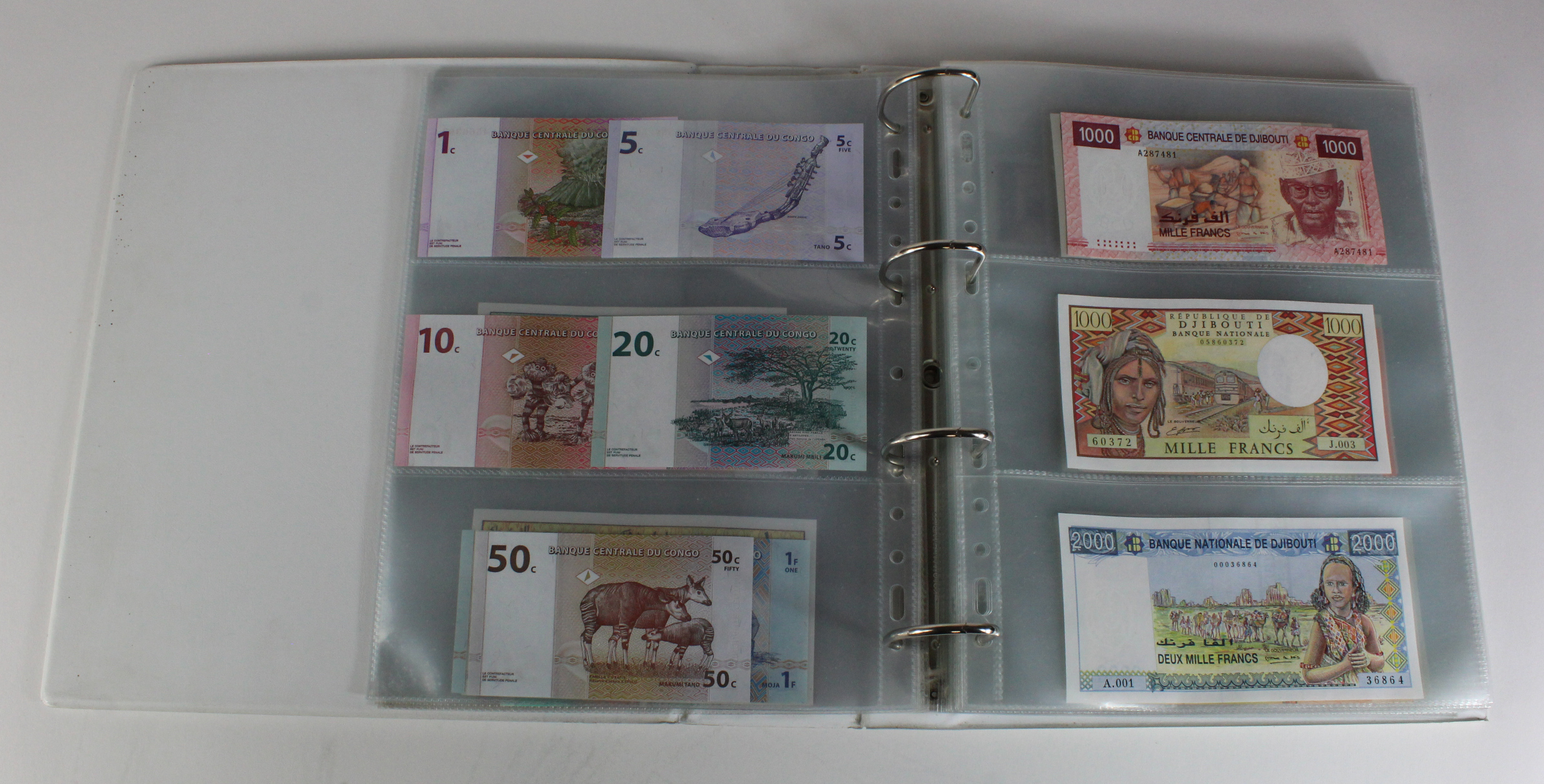 World, Africa (151) a superb collection of Uncirculated notes in an album, Algeria, Angola, - Image 8 of 44