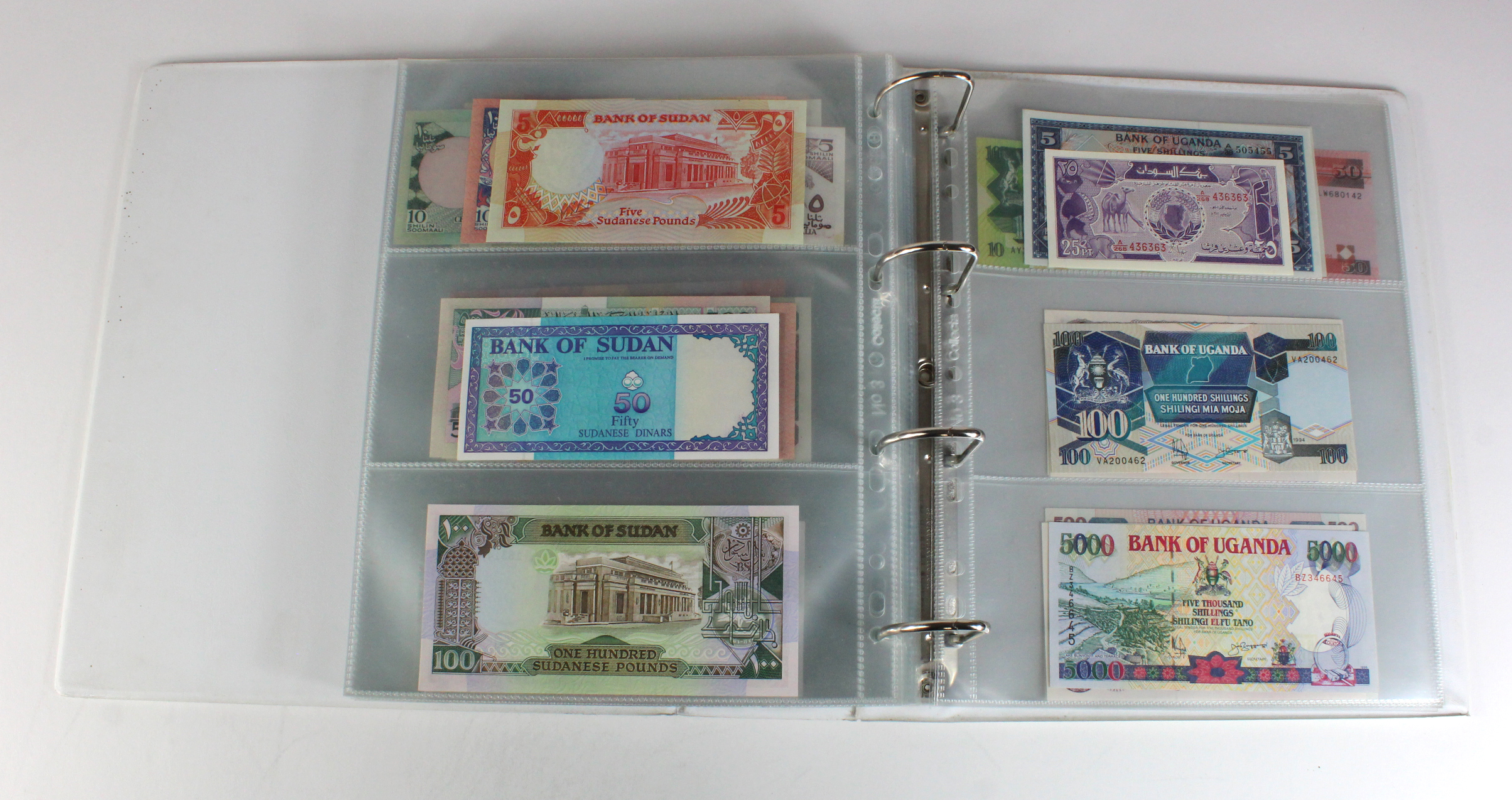 World, Africa (151) a superb collection of Uncirculated notes in an album, Algeria, Angola, - Image 43 of 44