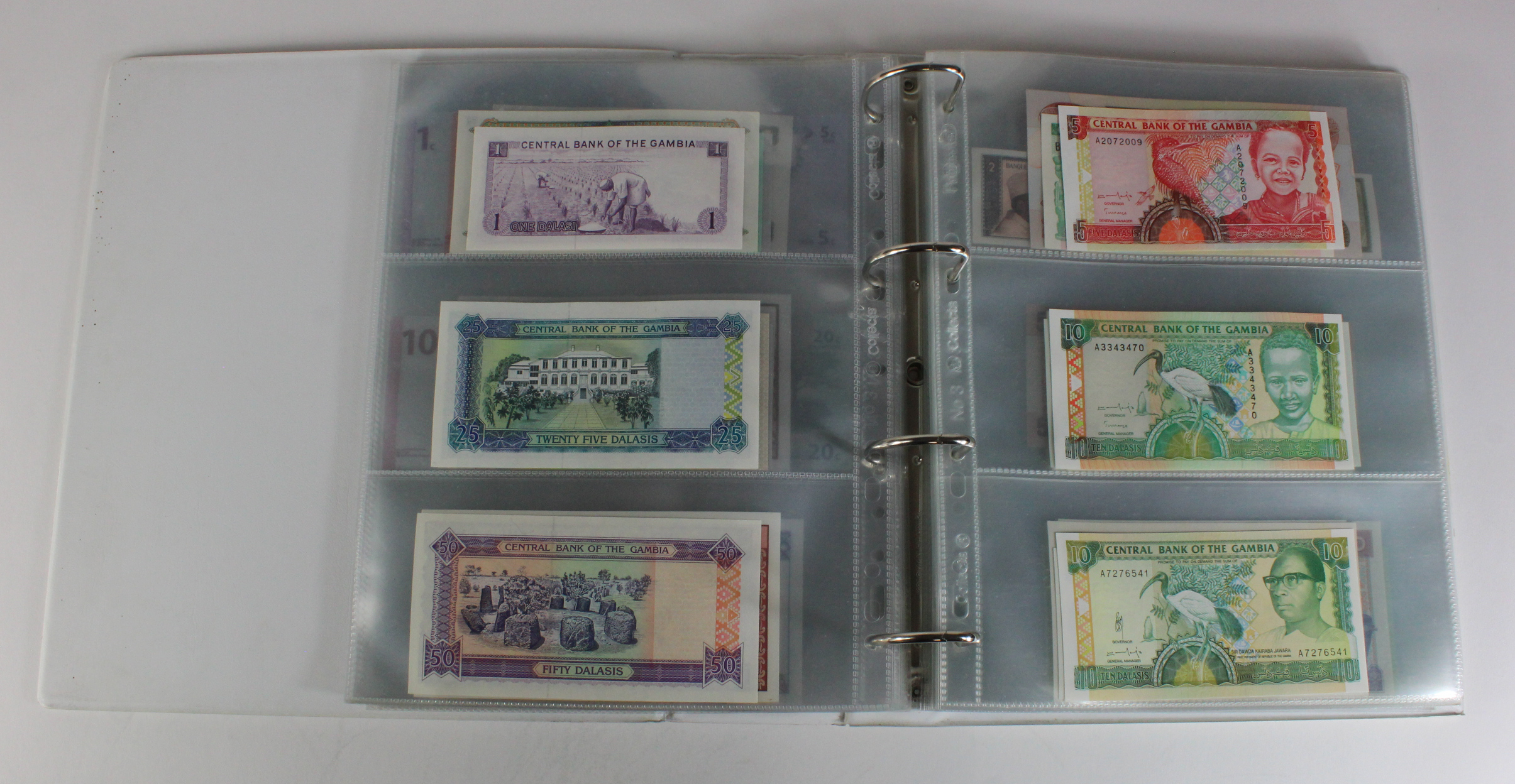 World, Africa (151) a superb collection of Uncirculated notes in an album, Algeria, Angola, - Image 13 of 44