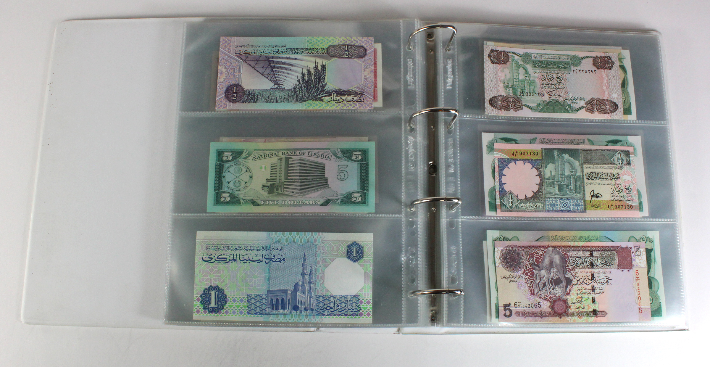 World, Africa (151) a superb collection of Uncirculated notes in an album, Algeria, Angola, - Image 26 of 44