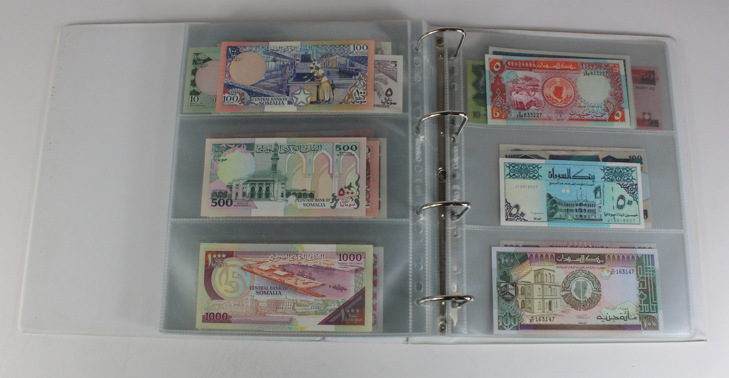 World, Africa (151) a superb collection of Uncirculated notes in an album, Algeria, Angola, - Image 42 of 44