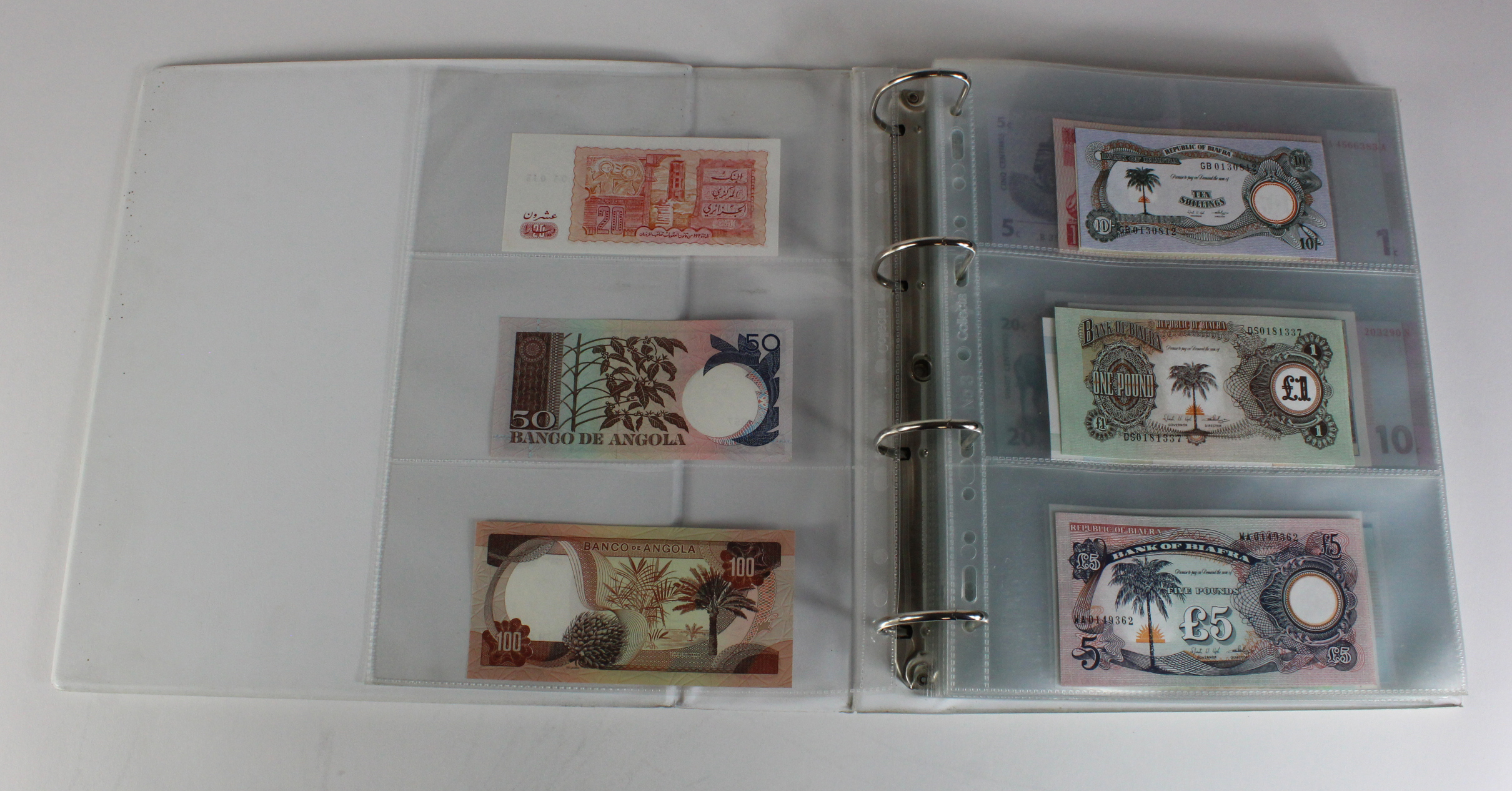 World, Africa (151) a superb collection of Uncirculated notes in an album, Algeria, Angola, - Image 3 of 44