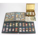 Mixed condition lot of old cigarette cards, large sized in small tin, and loose in two early albums.