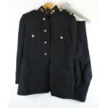 Military uniforms including an officer in the Royal Artillery with officers service uniform to a