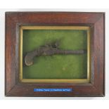 Flint lock, 18th century pocket pistol in relic condition, in frame. Vendor states found in