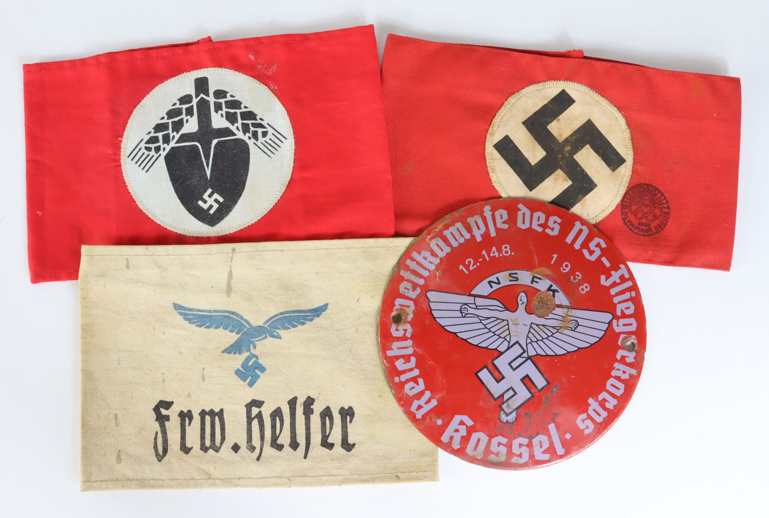 German Nazi armbands various (x3), plus an NSFK 1938 event wall plaque (15cm). (4 items)