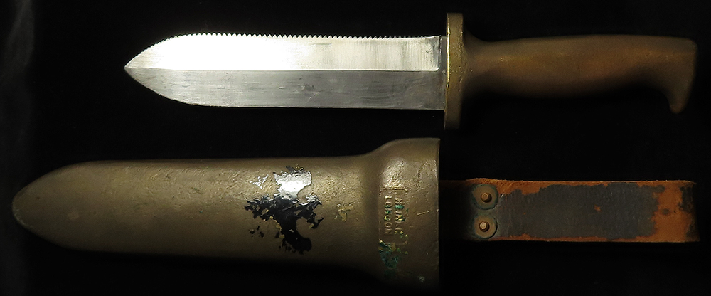 Knife - a good pre WW2 brass Diving knife by Ce Heinke London, circa 1922-1950. Push in knife with