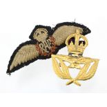 WW2 original RAF Pilots Wings and all-gilding metal Wartime Economy RAF Officers Cap Badge. (2)