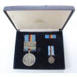 British Forces Germany 1945-1989 medal in fitted case with miniature and medal bars named to