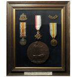 1915 Star Trio + Death Plaque and badges housed in original glazed frame, to 20617 Pte Arthur Robert