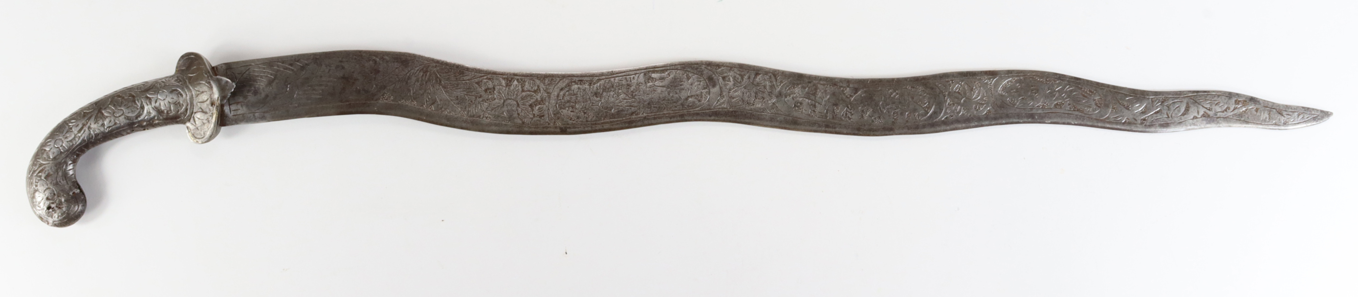 Indian 19th century curved and engraved blade sword, no scabbard. All steel. (approx 30.5 inches)