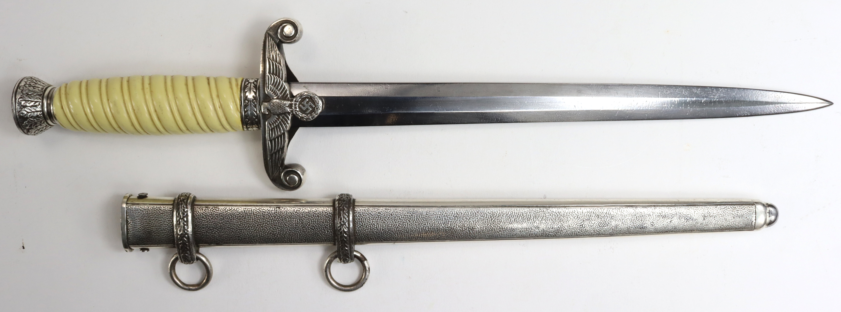 German Nazi Army Dagger with scabbard, blade maker marked 'WKC Solingen'.