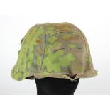 German Camo helmet cover, well used, two out of three fittings, with an original fire brigade helmet