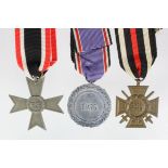 German Luftshutz medal, War Merit cross without swords, German Cross of Honour with swords.
