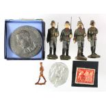 German Nazi items, elastin figures, an Adolf Hitler plaque, stamp etc