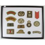 ATS WW2 selection of cloth badges in frame.