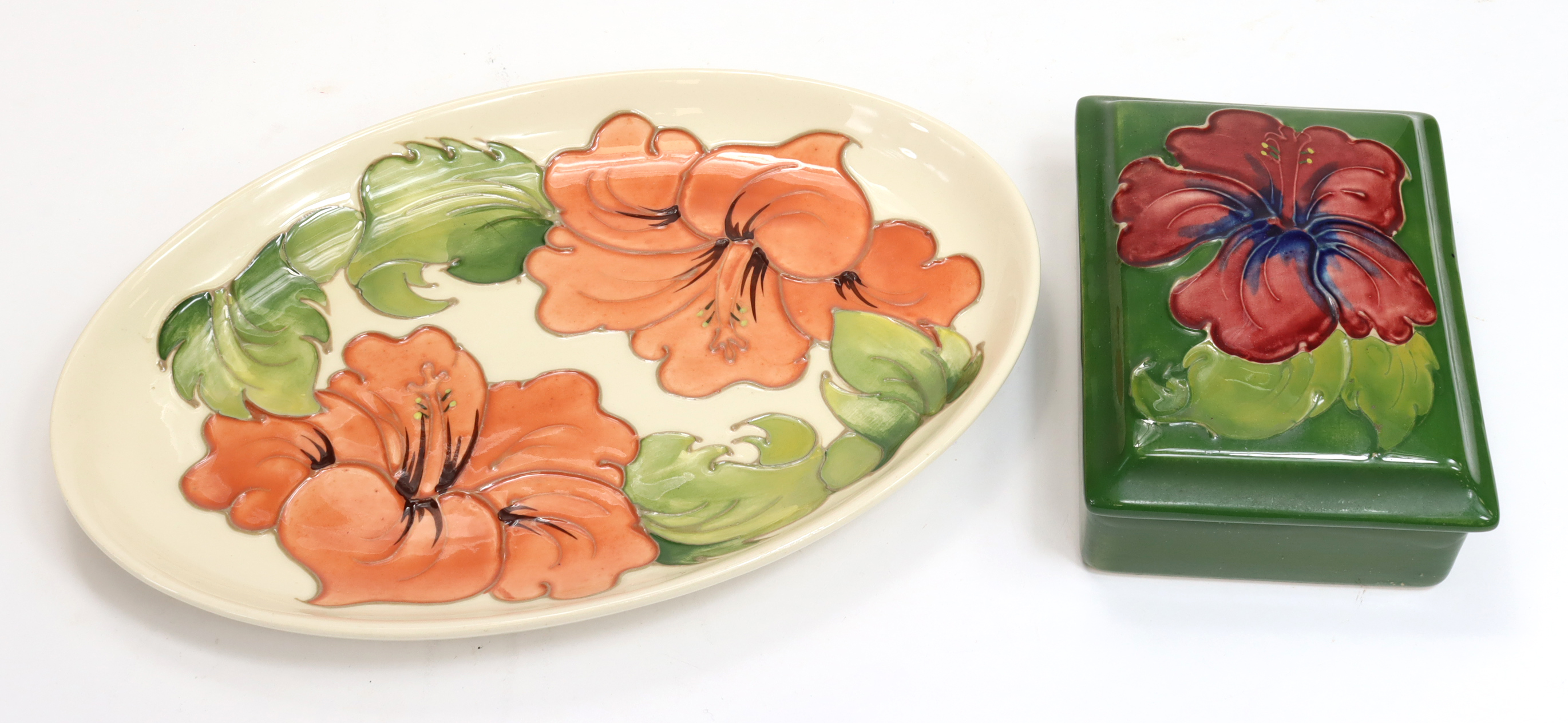 Moorcroft. A 'Hibiscus' Cream Oval Pin Dish (1960-1979) length approx 23cm. with a rectangular '