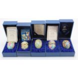 Halcyon Days. Five enamel Easter eggs by Halcyon Days, contained in original boxes, circa 1995,