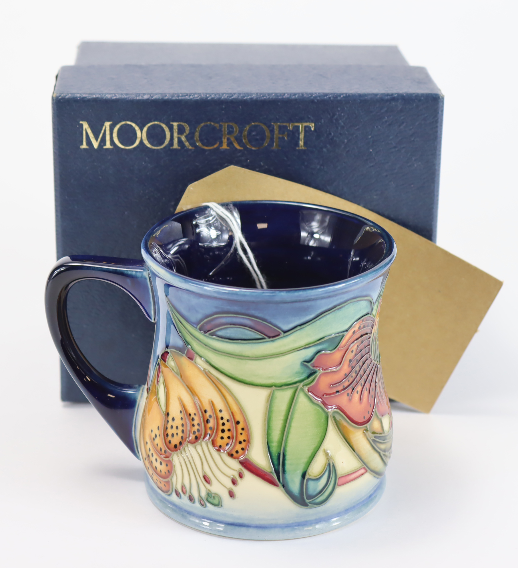 Moorcroft. 'Anna Lily' Mug by Nicola Slaney (1998). Signed W/M. Boxed. First Quality. Height approx.