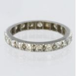 Tests as 18ct white gold diamond set full eternity ring set with twenty two round brilliant cut