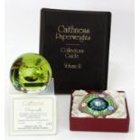 Two paperweights, comprising a limited edition Caithness Dragonfly paperweight, diameter 70mm