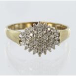 9ct yellow gold four row cluster ring set with fourty three diamonds with a known diamond weight